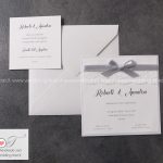 partecipazione matrimonio decorata con pizzo e nastro in raso elegante e raffinata