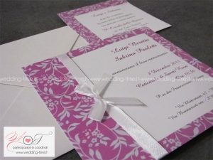 partecipazione matrimonio classica elegante con nastrino e grafica floreale