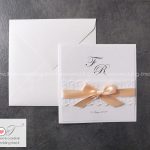 partecipazione di matrimonio elegante con pizzo e nastro salmone